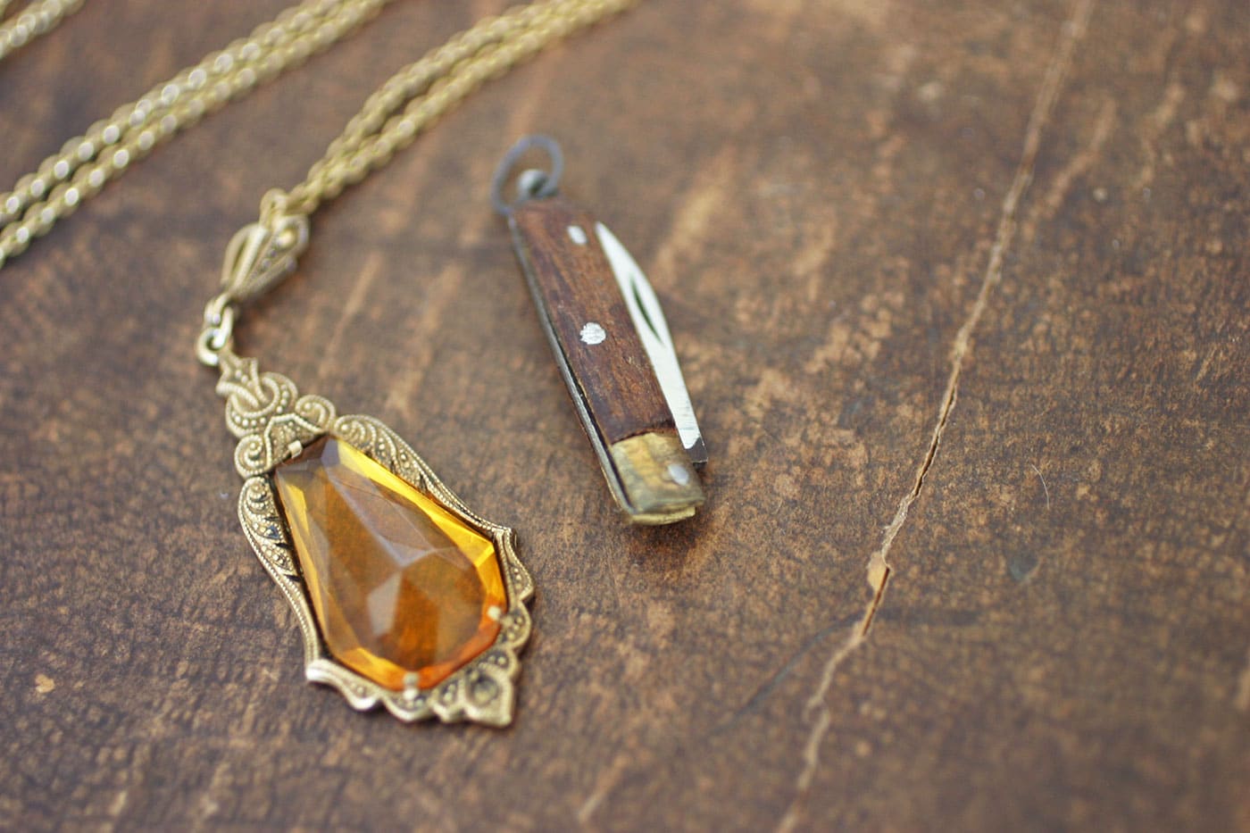 Vintage glass necklace and miniature pen knife