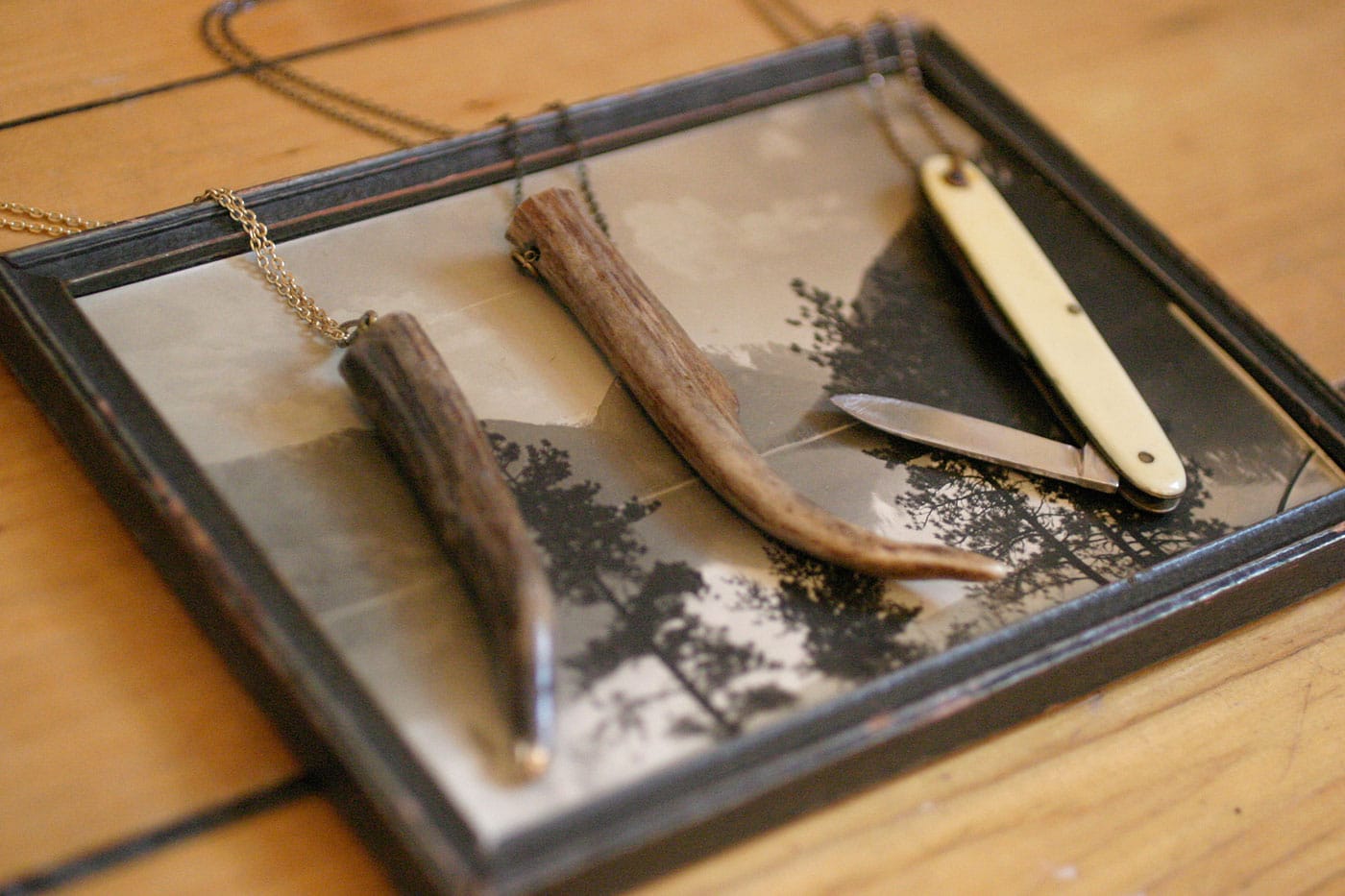 Antler necklaces and pen knife necklace